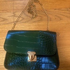 Green purse with gold